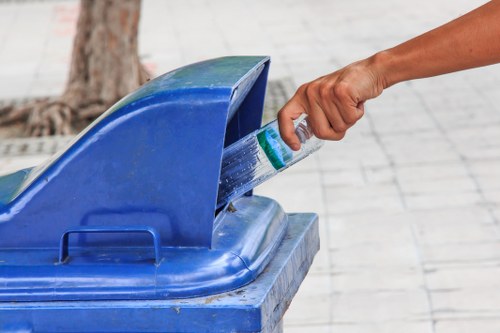 Low-emission van fleet lined up ready for sustainable rubbish collection